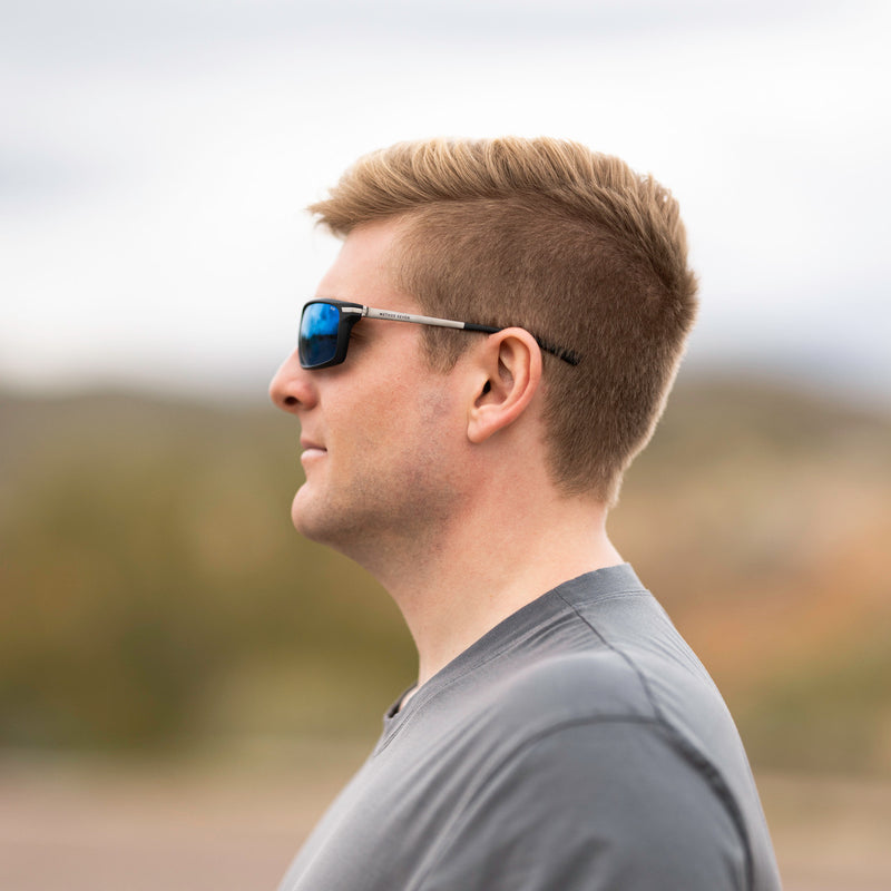 A person wearing Method Seven Pilot Altitude FLT18 sunglasses for pilots. 