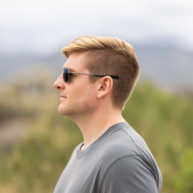 A person wearing Method Seven Pilot Ascent FLT18 sunglasses for pilots. 