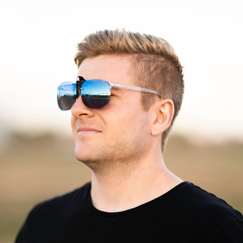 A person wearing Method Seven Pilot FLT18 Clip-On sunglasses for pilots. 