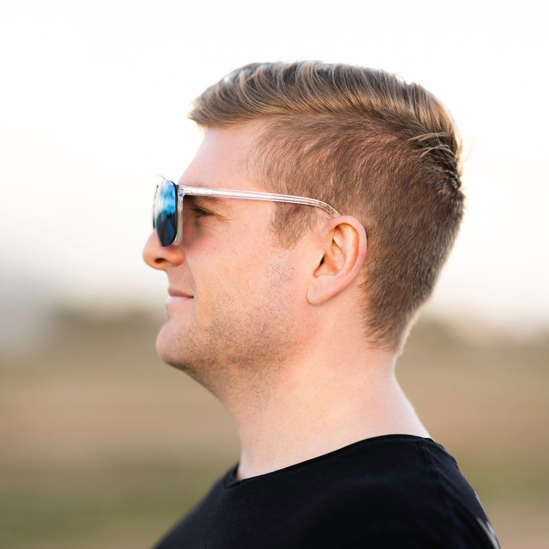 A person wearing Method Seven Pilot FLT18 Clip-On sunglasses for pilots. 